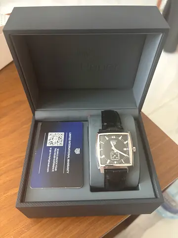 TAG Heuer Monaco men's quartz watch in original box with warranty card