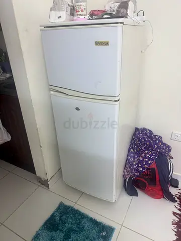 Small white upright refrigerator - good working condition aed 280/- final 0555246286