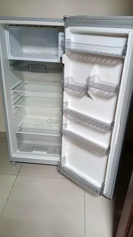 Small single-door fridge with freezer compartment - used, good condition