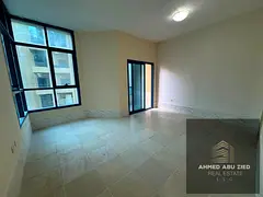 A spacious, high-specification apartment featuring two bedrooms, a living room, and a maid's room. I
