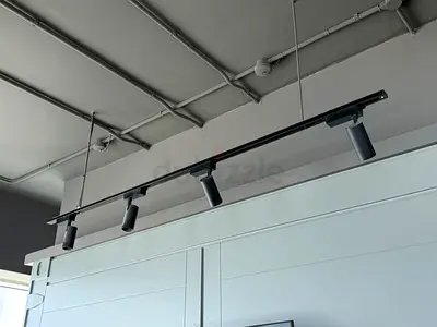 Black Track Lighting with 4 Adjustable Spotlights - 4 pcs for AED 500