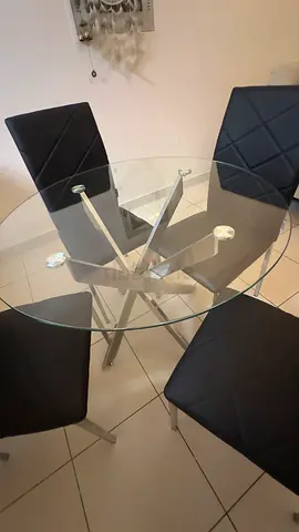 Glass Round Dining Table with 4 Black Faux Leather Chairs - Good Condition