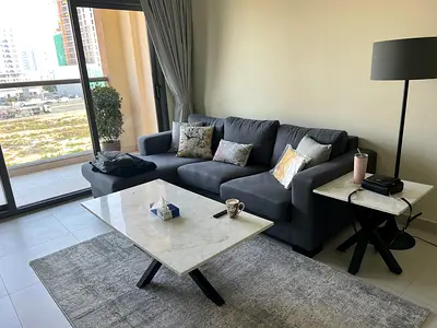 Grey 3-Seater Sectional Sofa with 4 pillows (great condition)