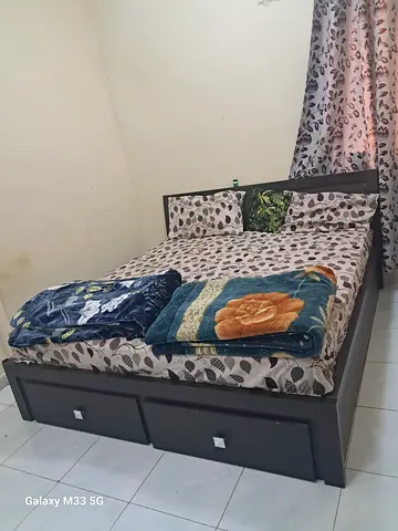 Double bed with under-bed drawers - good condition negotiable urgent salee