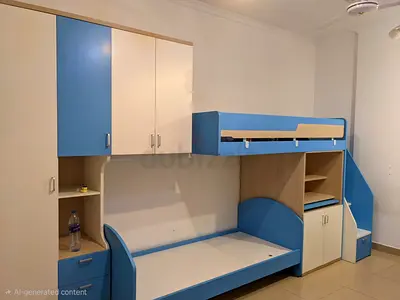 Blue & white kids bunk bed with storage and study shelves