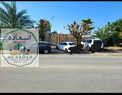 Corner house for sale in Al Ghafia, located on a paved road. It features 3 bedrooms, a living room,