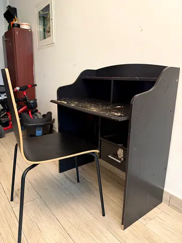 Compact dark wood study desk with matching chair