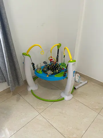 Baby Jumper / Activity Seat with Toys - Good Condition
