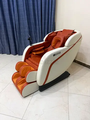 Full-body electric massage chair — perfect condition still under warranty