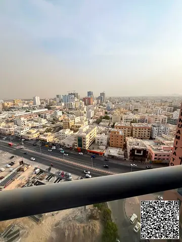 Two-bedroom apartment with a living room in Al Nuaimiya Tower One, with parking, central air conditioning, balcony, and two bathrooms, for ren 45000t