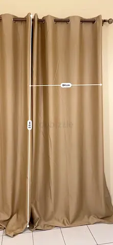 Beige eyelet curtains (pair) with good quality metal rod — 84cm width x 250cm length each