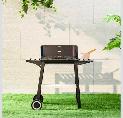 Portable charcoal BBQ grill with side trays and wheels - good condition