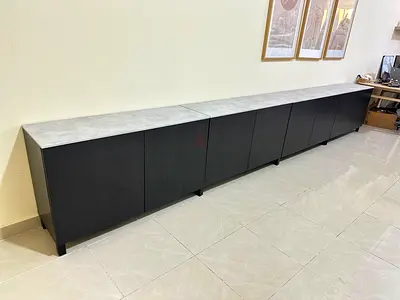 Long low storage cabinet with marble-look top — 6-door sideboard