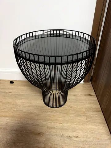 Black metal wire side table with glass top