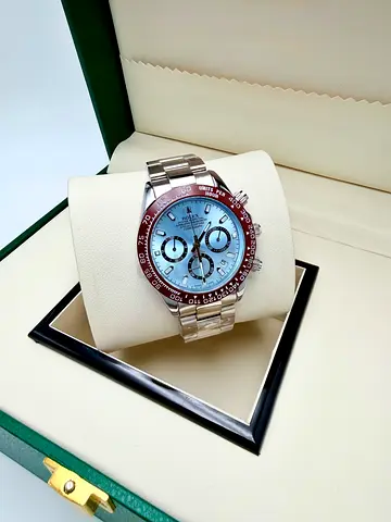 Rolex Daytona style chronograph watch with ice-blue dial and brown bezel