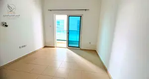 1-Bedroom Apartment for Annual Rent in City Tower, Ajman – Khalifa Street | Balcony & Private Park