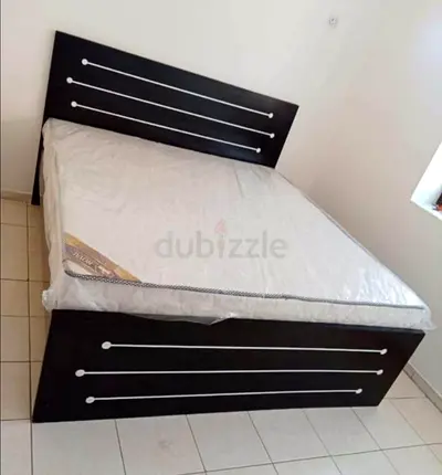 Brand new wooden 180 × 200 king size bed including mattress available