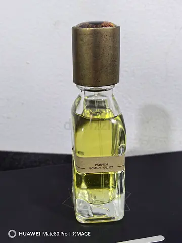 50ml Parfum in glass bottle with decorative cap - lightly used