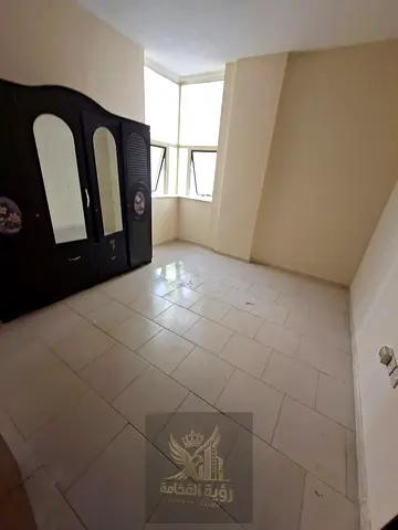 Annual Apartment for Rent in Sharjah – Al Butaina A comfortable one-bedroom apartment with a living room, featuring central air conditioning, central