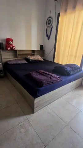 King size bed frame with headboard storage - light wood finish
