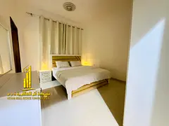 Luxury apartment (second occupancy), featuring a bedroom and living room with an open view. in Al Nu