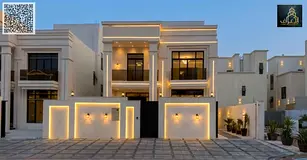 A luxurious villa featuring a classic design and a spacious rooftop terrace; freehold ownership. It 