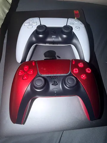 Two Sony DualSense PS5 Controllers (White and Red) - Good Working Condition