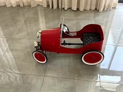 Vintage-style Red Pedal Car for Kids — Good Condition