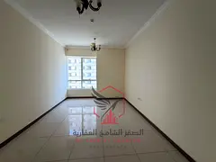 **Luxury One-Bedroom Apartment with American Kitchen, Modern Design, Spacious Layout, One Month Free