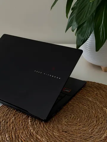 Slim black laptop - good condition, light use