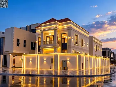 Luxury Corner Villa for Sale in Al Helio 2 – Ajman | Two Floors Plus Roof | Stone Facade | Corner Plot (Two Streets) | Facing Amenities | Registration