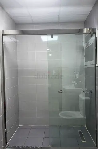 Sliding Glass Shower Enclosure with Stainless Frame - Used