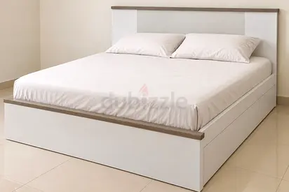 White platform king bed with storage drawers - good condition