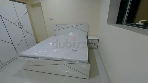 White modern queen bed with matching wardrobe and bedside table - like new