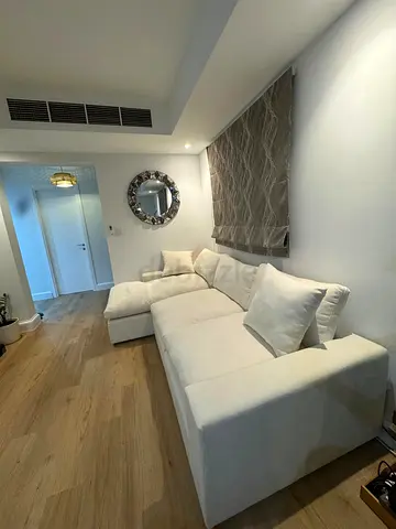 White L-shaped Sofa with Chaise - Good Condition