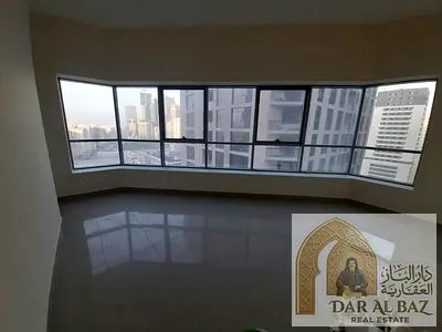 A three-bedroom apartment with a living room is available for annual rent in the Al Khan area of Sharjah. It features three master bedrooms, four ba
