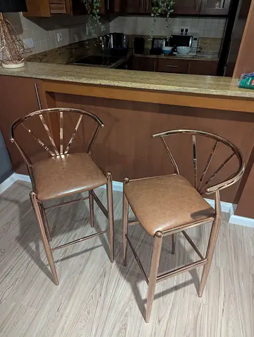 Pair of metal bar stools with cushioned seats - copper finish
