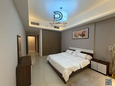 A room and a hall ready to move in in the latest towers of Ajman with an area of 1142 sq. ft. and t