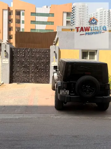 🔥🏡 لقطة العائلات في عجمان! ملحق فاخر ونظيف بالراشدية | 3 غرف وصالتان وموقف خاص بـ 50,000 درهم سنويًا!