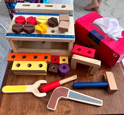 Wooden toy tool bench with hammer, saw and shape pegs - excellent condition