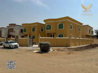 فيلتان للبيع في المويهات 2 – عجمان | استثماري وسكني | 5 غرف نوم | موقع مميز بالقرب من شارع الشيخ عمار