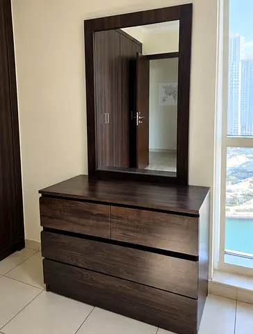 Dark Wood 4-Drawer Dresser with Mirror - Good Condition