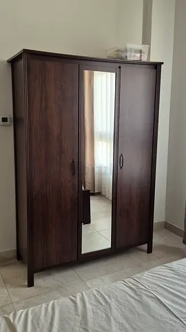 Dark wood 3-door wardrobe with mirror - good condition