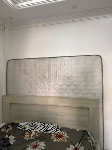 King size 2 months used Mattress in Good Condition with Wooden Headboard