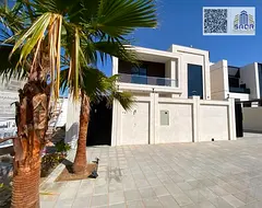 A luxurious residential experience featuring spacious layouts and modern designs suited to large fam