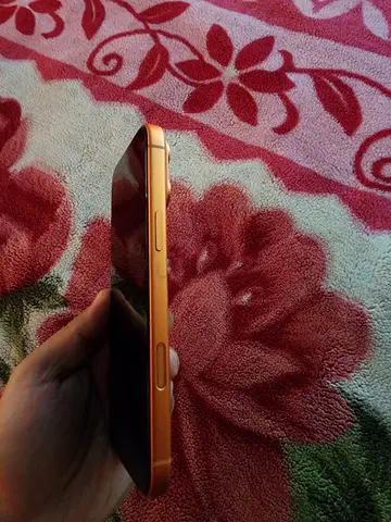 Used orange iPhone 17 pro Max with case original box and cable - best working condition. 98% battery