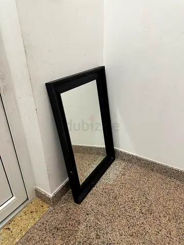 Rectangular Black Wooden Framed Wall Mirror (100×67 cm) – AED 30