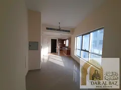 Studio for annual rent in Sharjah (Al Khan area, opposite Nesto). It features a spacious layout, an 