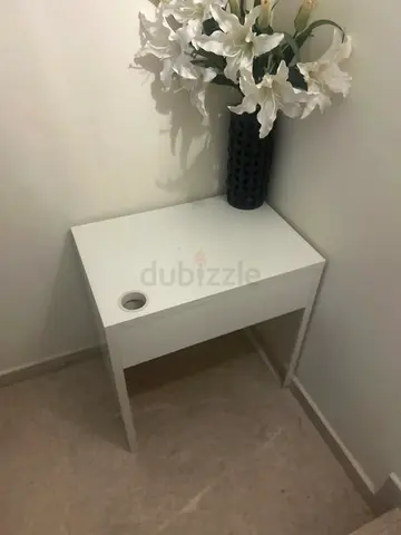 Simple white desk table with cable hole