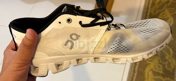 QC branded shoes
